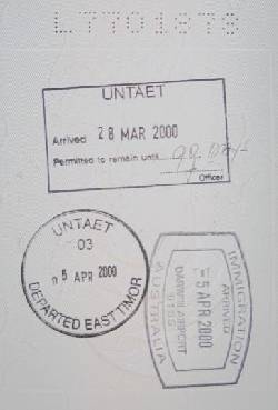 The entry and exit stamps in Neville's passport: 'United Nations Temporary Administration in East Timor'.